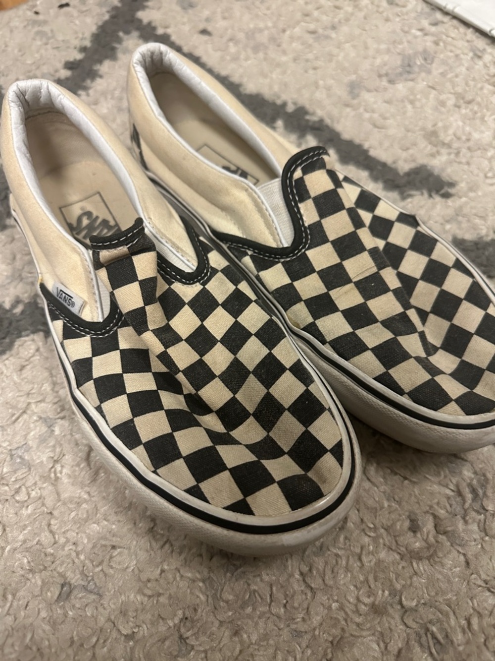 Vans Woman Checkerboard Slip-On Sneakers in Black & Cream